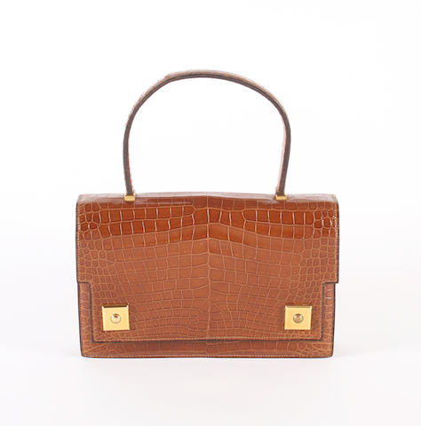 HERM&#200;S: A light brown patent crocodile skin 'Piano' bag, 1950s