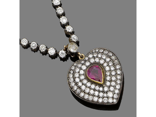 A diamond rivi&#232;re with a ruby and diamond pendant