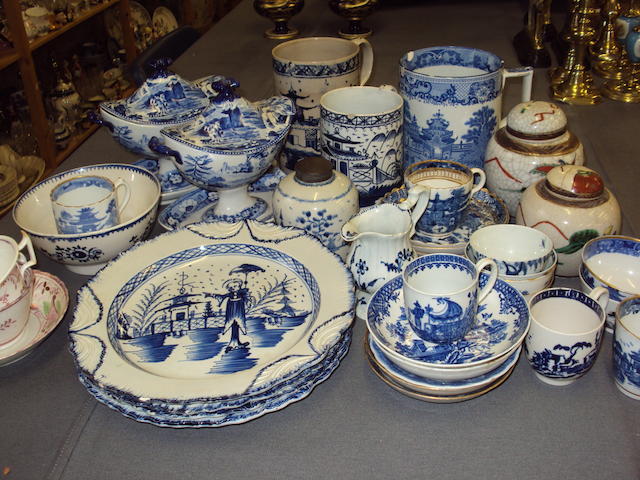 A mixed collection of blue and white ceramics