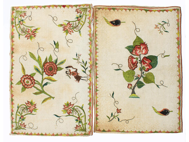 Two early 18th century embroidered and quilted cushion covers