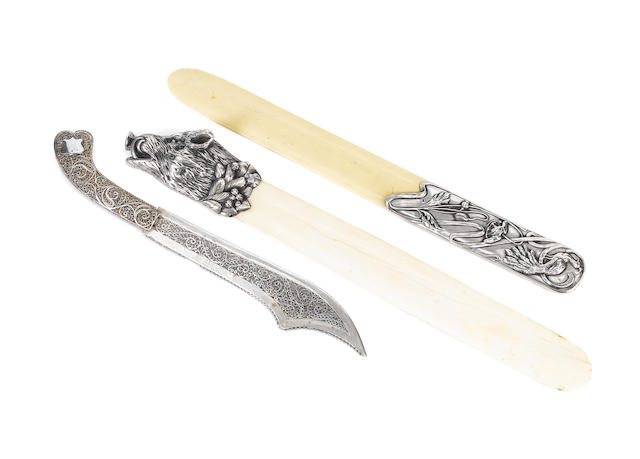 A late 19th century Russian silver-mounted ivory paper knife, by Ivan Klebnikov, Moscow, also marked with later kokoshnik mark, another page turner and a silver filigree paper knife (3)