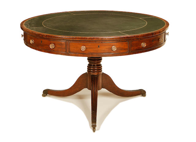 A George IV mahogany drum top library table