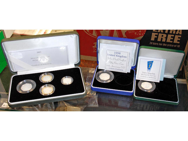 A collection of Elizabth II proof silver coins, to include commemorative coins of Canada and Australia.