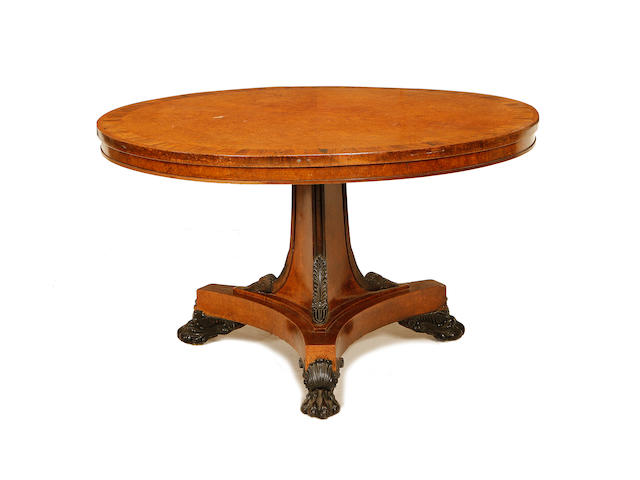 A Regency amboyna and rosewood crossbanded breakfast table