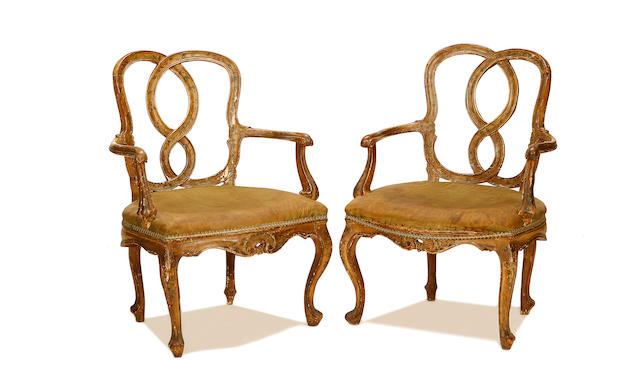 A pair of Venetian third quarter 18th century polychrome decorated armchairs