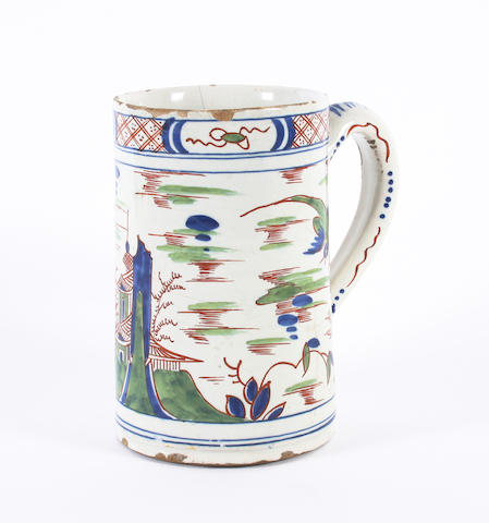 A Dutch Delft polychrome mug, second quarter 18th century