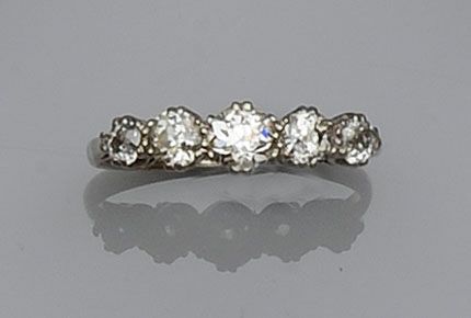 A diamond five stone ring