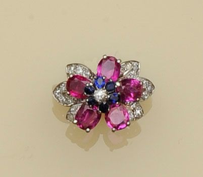 A ruby, sapphire and diamond cluster ring