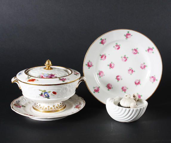 A Nantgarw sauce tureen, a cover and a stand, a Swansea inkstand and cover and a Swansea plate, circa 1815-20