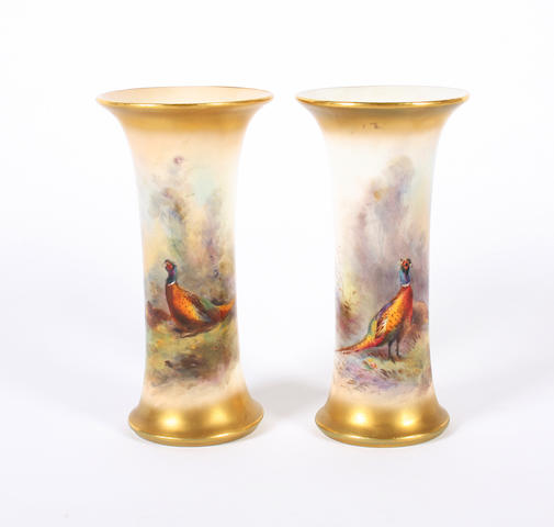 A pair of Royal Worcester spill vases, dated 1930