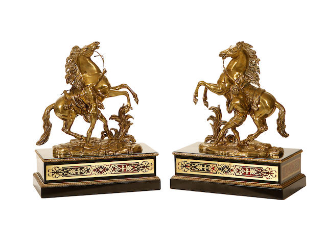 After Guillaume Coustou, French (1677-1746) A pair of 19th century bronze models of the Marley Horses