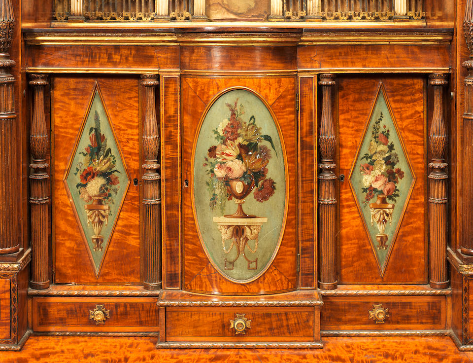 A satinwood, mahogany, sycamore and marquetry and parcel gilt secretaire cabinet reconstructed from an important cabinet by Seddon, Son & Shackleton of 1793 reputedly for Charles IV of Spain, the panels possibly by William Hamilton R.A
