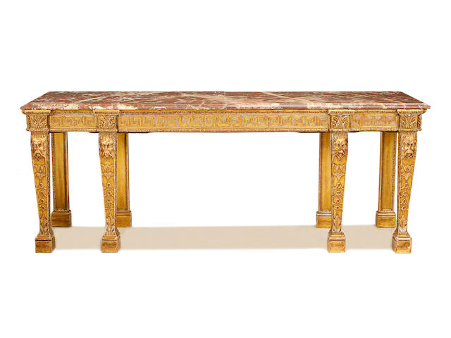 A large late 19th/early 20th century carved giltwood serving table in the George II style