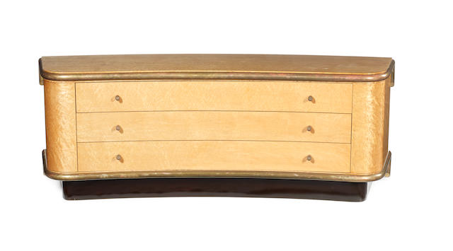 Chest of Drawers attributed to Gucci circa 1975  birds eye maple with gilt bronze trim and fittings, the handles moulded with the double G  monogram  66 by 185 by 55 cm. 26 by 72 13/16 by 21 5/8 in.
