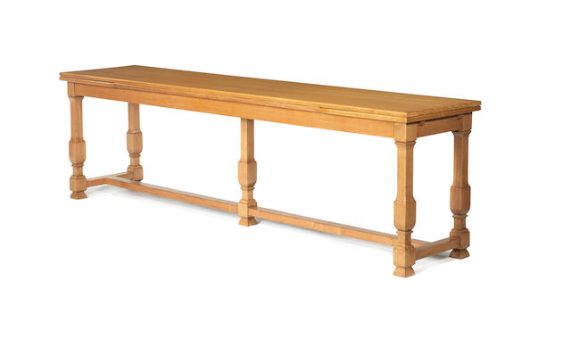 Extending Console Table French, circa 1940 in the style of J C Moreux  oak  74.5 by 275 by 54.5 cm. 29 5/16 by 108 1/4 by 21 7/16 in. Extended width: 387 cm.                        152 3/8 in.