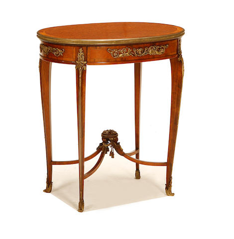 A French late 19th century gilt metal mounted rosewood and parquetry occasional table in the Transitional style
