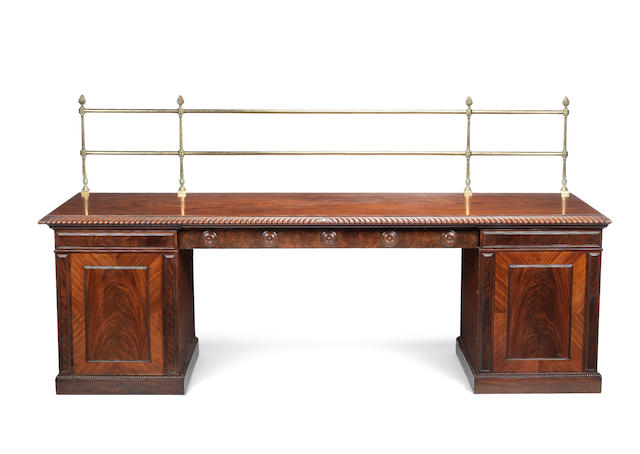 A large Regency mahogany pedestal sideboard probably Irish