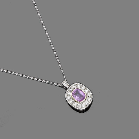 A pink sapphire and diamond pendant