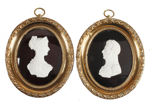 French School, circa 1810 A pair of profiles, probably Louis Antoine, Duke of Angoul&#234;me and Marie Th&#233;r&#232;se of France: he wearing uniform, medals and breast star of the Order of St. Esprit; she, wearing dress and tiara
