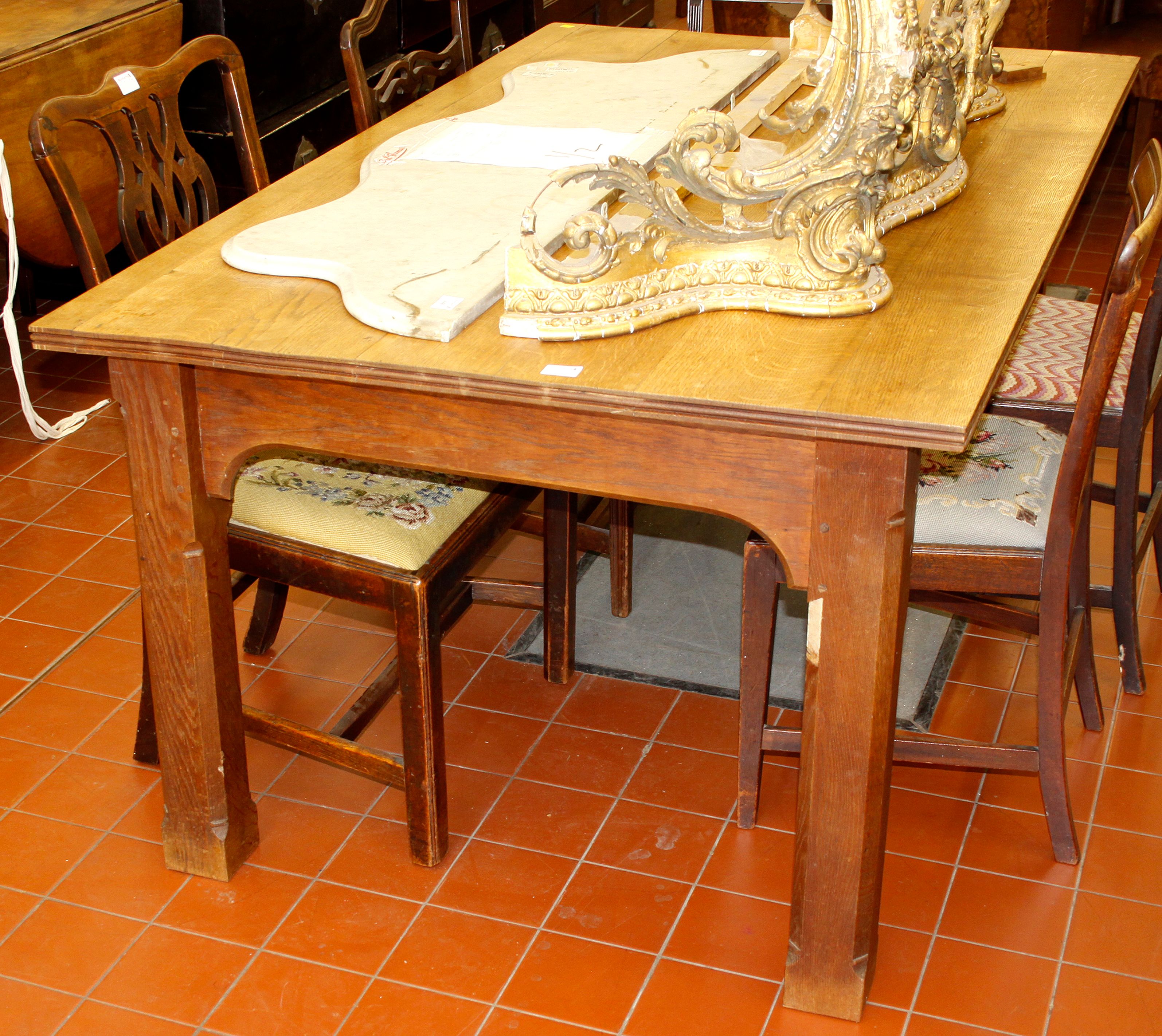 A planked oak rectangular dining table,