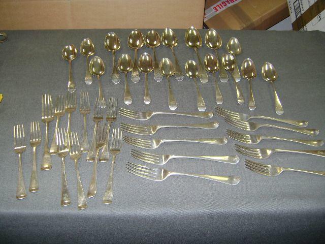 A composite canteen of Hanoverian flatware, mixed dates and makers, London 1795 - 1807