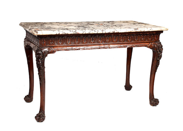 A George III Irish mahogany console table with variegated marble top