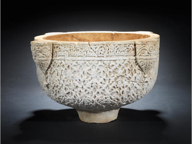 A rare and important Zangid carved marble Basin Jazira or Syria, 12th Century
