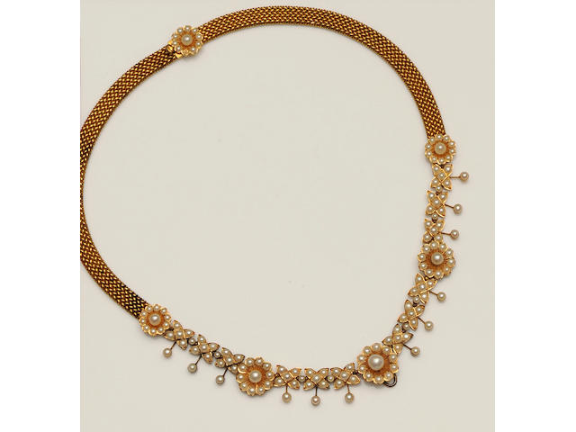 A late Victorian gold mounted half pearl necklace