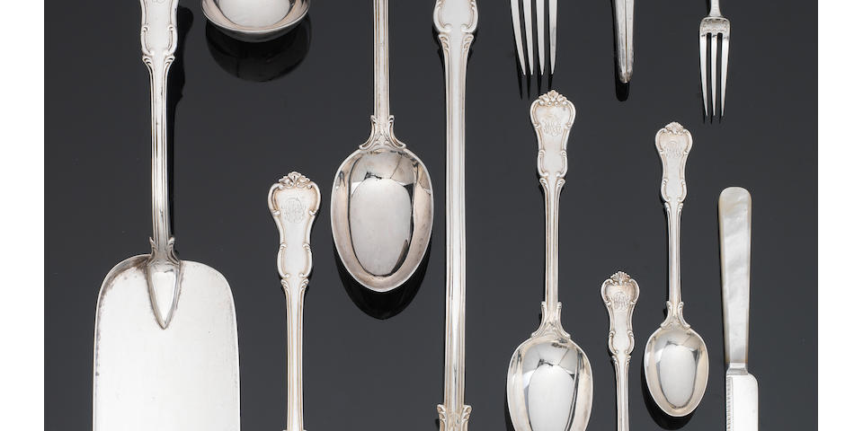 An Edwardian silver Princess pattern table service of flatware, contained in a canteen, by Goldsmiths & Silversmiths Co. Ltd, London 1906 - 1908,