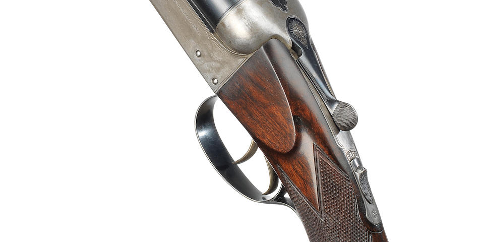 A .470 (3&#188;in) boxlock ejector rifle by Holland & Holland, no. 32007 In a Westley Richards leather case with reproduction Holland & Holland trade-label