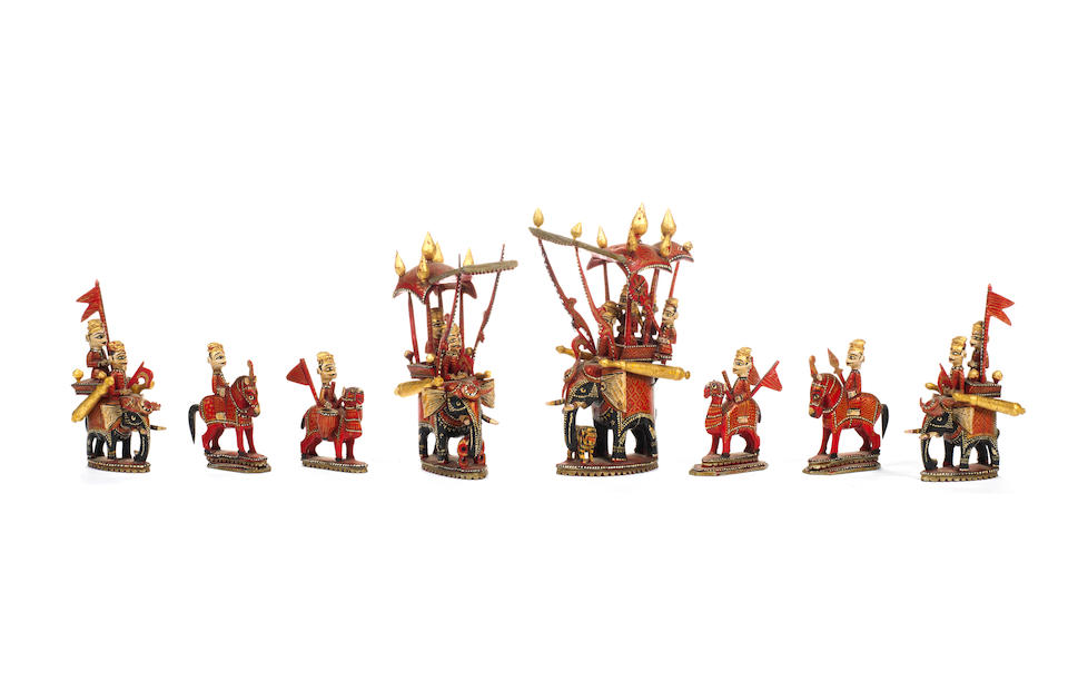 An Indian lacquered ivory figural chess set, Rajasthan, circa 1850,