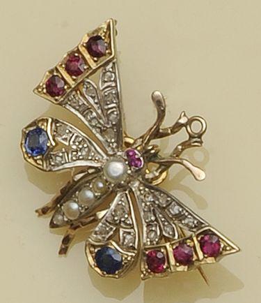 A vari gem-set butterfly brooch