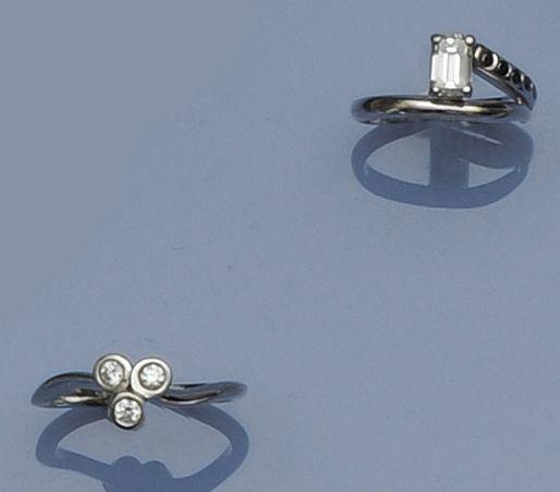 Two platinum and diamond set dress rings
