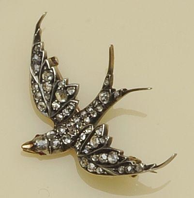 A late Victorian diamond swallow brooch