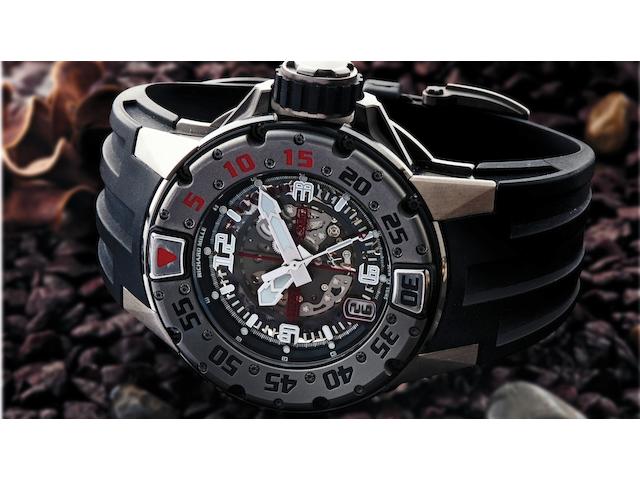 Richard Mille. A very fine and important diver's titanium calendar automatic wristwatchRM028, Recent