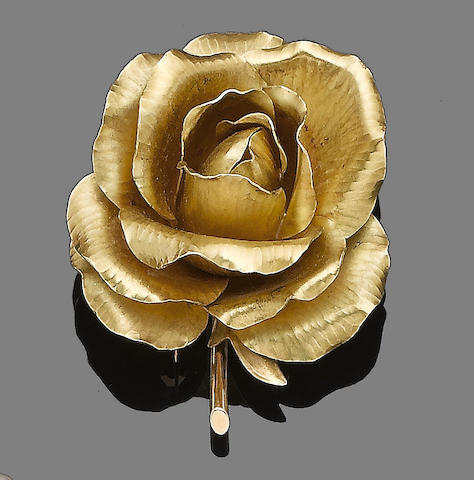 A flower brooch, by Cartier,
