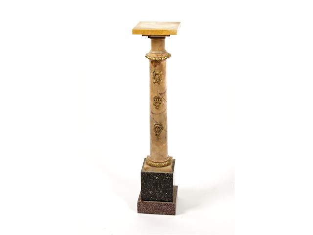 An early 20th century gilt metal mounted vari-marble pedestal