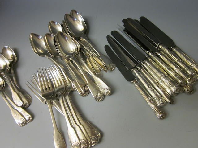 A composite canteen of George IV/William IV fiddle and shell pattern flatware and cutlery, mixed dates, London 1821, Dublin 1830, 1833