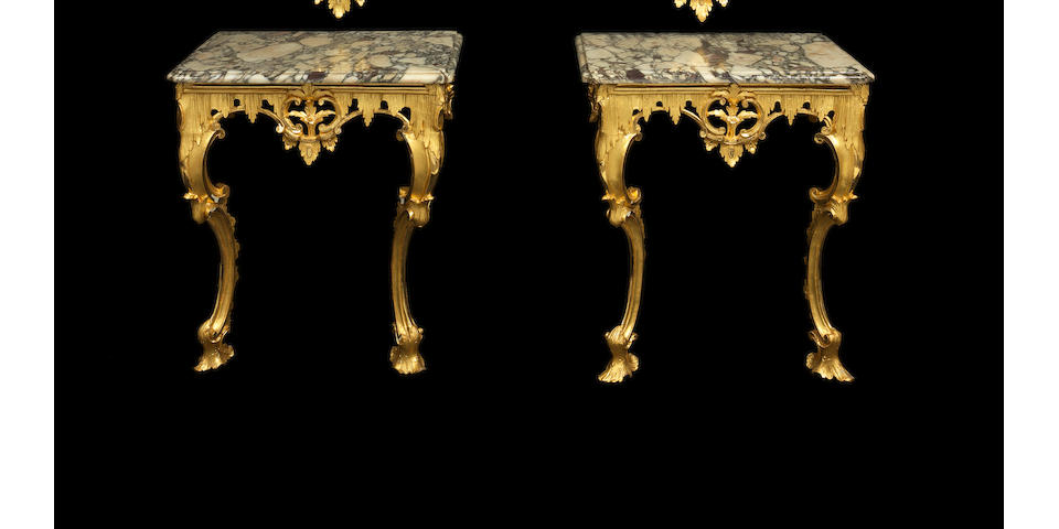 A pair of late George II carved giltwood console tables with pier mirrors en-suite