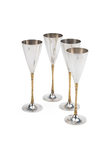 STUART DEVLIN: A set of four silver and silver-gilt champagne flutes London 1980  (4)