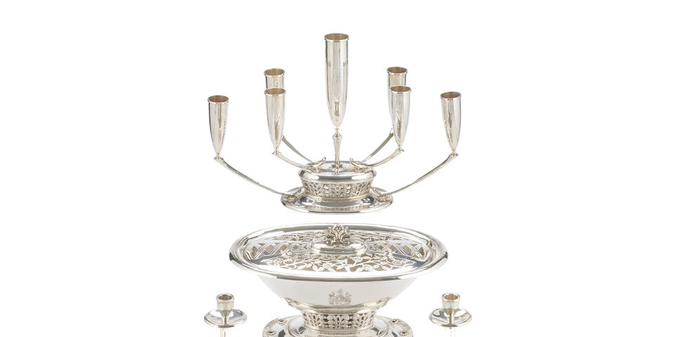 An impressive silver centrepiece and candelabrum together with a pair of candelabra ensuite By Boodle and Dunthorne, of Liverpool, London 1963 and 1964  (4)