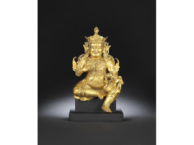 A gilt-bronze figure of Jambhala Early Qing dynasty