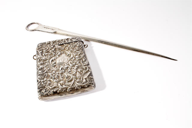 An Edwardian silver card case by The Goldsmiths and Silversmiths Co Ltd, London, 1900,  (2)