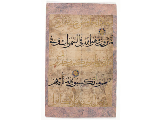 A fragment of a leaf from a large Qur'an partially written in gold in muhaqqaq script Timurid, probably Herat or Samarkand, early 15th Century