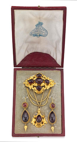 Bonhams : A mid 19th century garnet brooch and pair of pendent earrings