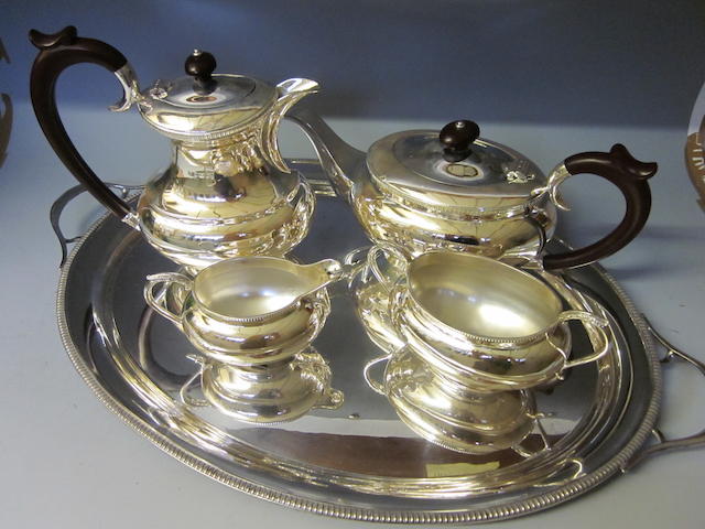 A four piece silver tea service by J B Chatterley and Sons Ltd, Sheffield 1977  (5)