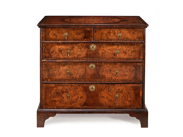 A William and Mary burr elm, walnut and elm featherbanded chest