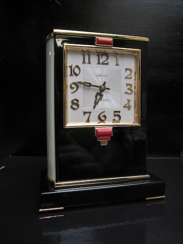 A 20th century French coral mounted lacquer mantel timepiece Cartier, No.G70 2038 for the European Watch and Clock Co Inc