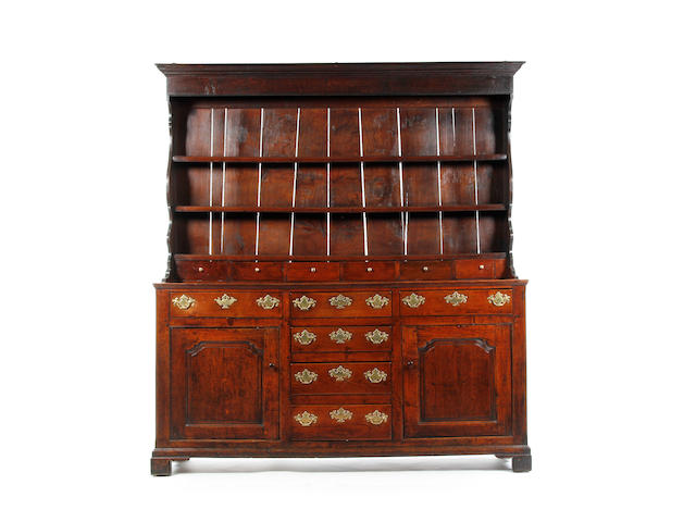 A good George III oak high dresser