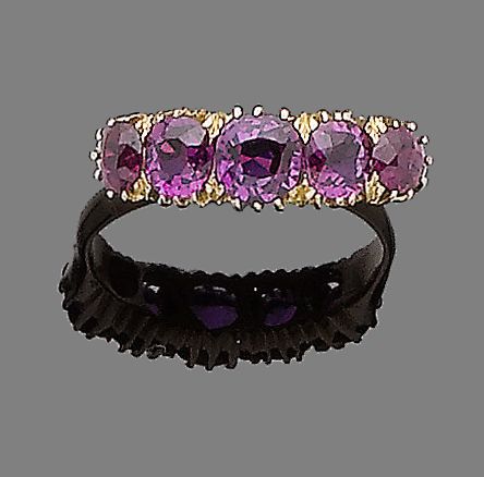 A ruby five-stone ring